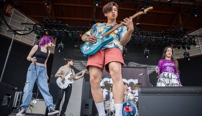 Boy playing a guitar